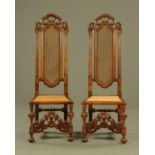 A pair of Carolean style high backed walnut occasional chairs,