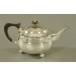 An Arts and Crafts silver teapot, Birmingham 1924 maker A E Jones. 337 grams (see illustration).