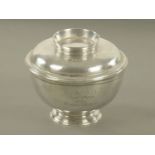 A George V silver lidded bowl, by Goldsmiths and Silversmiths Company,