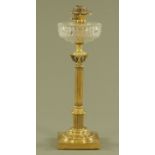 A large Victorian brass oil lamp,