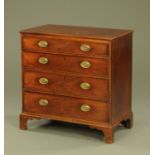 A George III mahogany chest of drawers,