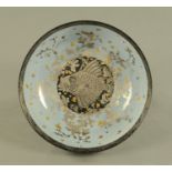 A Royal Doulton Titanian fruit bowl, decorated with a fish to the centre, black printed mark verso.