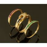 A trio of 14 ct gold gem set rings, ruby, emerald, diamond and sapphire,