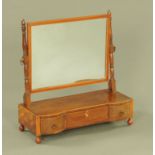 A George III mahogany toilet mirror, rectangular and boxwood strung,