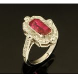 An 18 ct gold ruby and diamond ring, ruby +/- 2.36 carats, size N (see illustration).