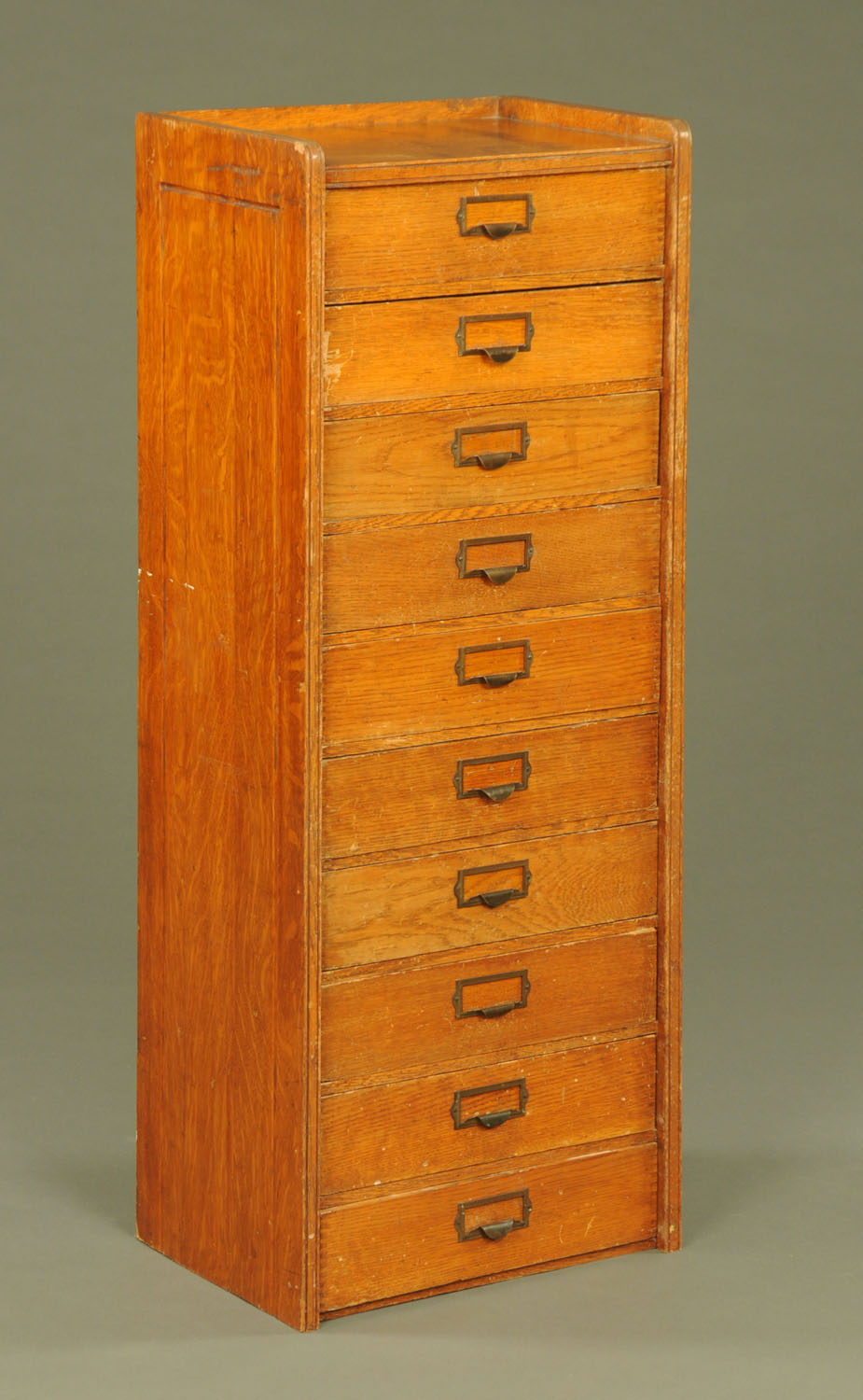 An early 20th century oak ten drawer set of filing drawers,