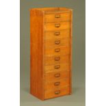 An early 20th century oak ten drawer set of filing drawers,