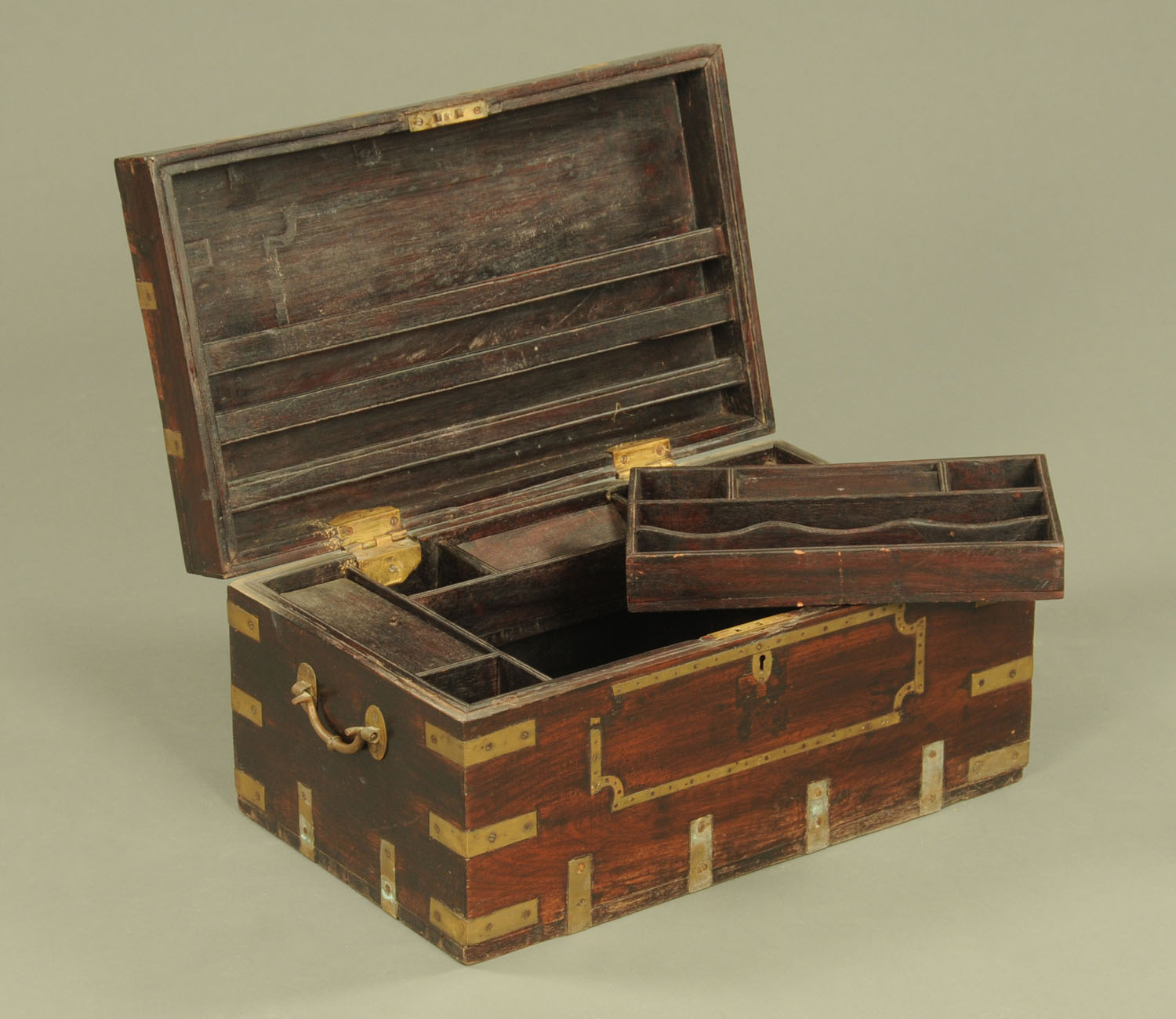 An Indian brass bound rectangular casket, with carrying handle to either side. - Image 2 of 2