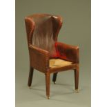 A Georgian mahogany child's wing chair,