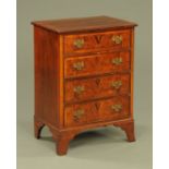 A George III style chest of drawers,