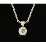 An 18 ct white gold pendant on chain, set with a diamond weighing +/- .52 carats.