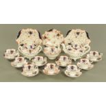 A 19th century Gaudy Welsh part tea service, comprising teapot, sugar basin, milk jug, bowl, 9 cups,