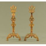 A pair of Art Deco Egyptian Revival Universal Electric Log Company Chicago andirons.