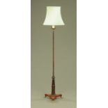 A Regency mahogany pole screen (converted to standard lamp),
