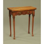 A Georgian mahogany turn over top hall table,