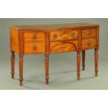 An early 19th century mahogany bow fronted sideboard,