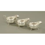 A set of three Edward VII silver oval sauce boats, comprising a pair and one slightly smaller,
