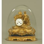 A 19th century French spelter figural mantle clock, with giltwood base and glass dome.