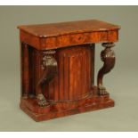 A 19th century Continental empire style inverted bowfront side cabinet,