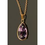 An 18 ct gold amethyst. CONDITION REPORT: Chain length 45.5 cm.