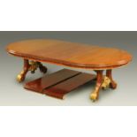 A Victorian mahogany extending dining table, with four leaves,