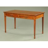 An Edwardian inlaid mahogany rectangular writing table, satinwood banded,