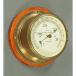 A Kelvin Bottomley and Baird Limited of Glasgow brass ships bulkhead style barometer,