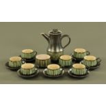 A stoneware coffee service, circa 1970, coffee pot, 8 cups, 7 saucers and sugar basin.