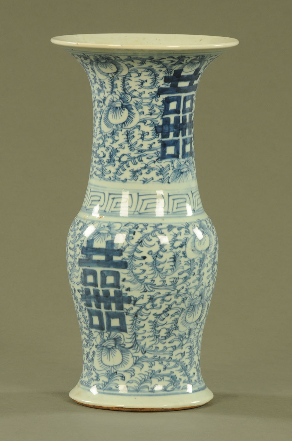A 19th century Chinese blue and white vase, with flared rim and four character mark to base.