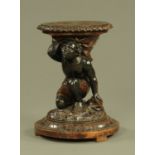 A 19th century walnut adjustable stand stool or table,