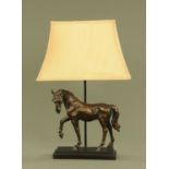 A simulated bronze table lamp in the form of a horse. Height to top of ear 38 cm.