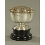 A silver rose bowl, raised on a wooden stand, inscribed Birmingham 1923, 335 grams.