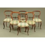 A set of six Victorian rosewood dining chairs,