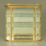 An Art Deco metal framed glazed hanging display cabinet, with adjustable glass shelves.