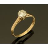 A 9 ct yellow gold solitaire diamond ring, size M/N.