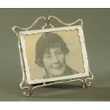An Asprey & Co silver photograph frame, London 1900. Maximum width 18.5 cm, height 17 cm.