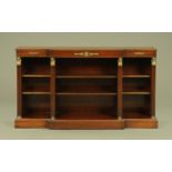 A Regency style mahogany reproduction breakfront bookcase,