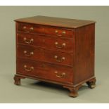 A George III oak chest of drawers,