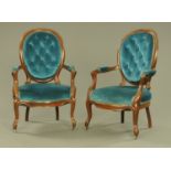 A pair of Continental cameo back open armchairs, with deep buttoned backs,