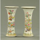 A pair of 19th century Chinese trumpet shaped vases, decorated with vases,