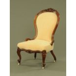 A Victorian walnut ladies chair,