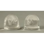 A pair of Lalique menu holders, signed "R. Lalique, France" and decorated with birds. Height 4.