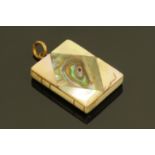 A 19th century book form mother of pearl pendant or charm. 2 cm x 2.7 cm.