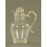 A Victorian silver mounted claret jug by Walter & Charles Sissons, Sheffield 1889. Height 25.
