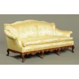 A Queen Anne style settee, upholstered in pale yellow foliate patterned silk type material,