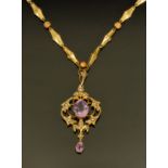 A Victorian amethyst and pearl brooch pendant, in yellow metal setting, stamped to the rear 9 ct,