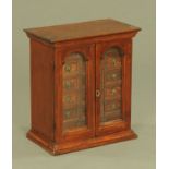 A Georgian mahogany tabletop cabinet,