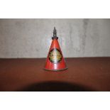 A vintage red painted conical oil can "V