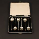 A mid 20th century cased set of silver c