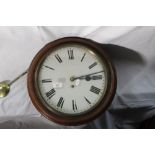 A Victorian mahogany circular wall clock